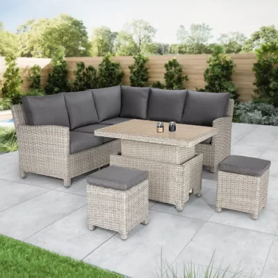 Palma Signiture Mini Corner Set with slat top table in white wash in a garden setting