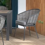Malo dining chair on a wooden veranda in the sunshine