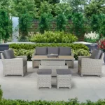 Palma Signature Sofa Set in white wash with a Alu Slat top table in the up position on a marble patio and planting