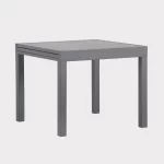 Sento 90 x 90 extending table in folded position on a white background