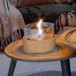 Tenderflame Cafe 18 Tabletop Candle on a coffee table